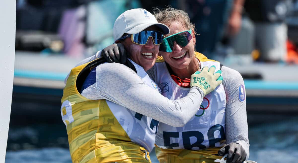 The French 49erFX crew celebrate their bronze medal